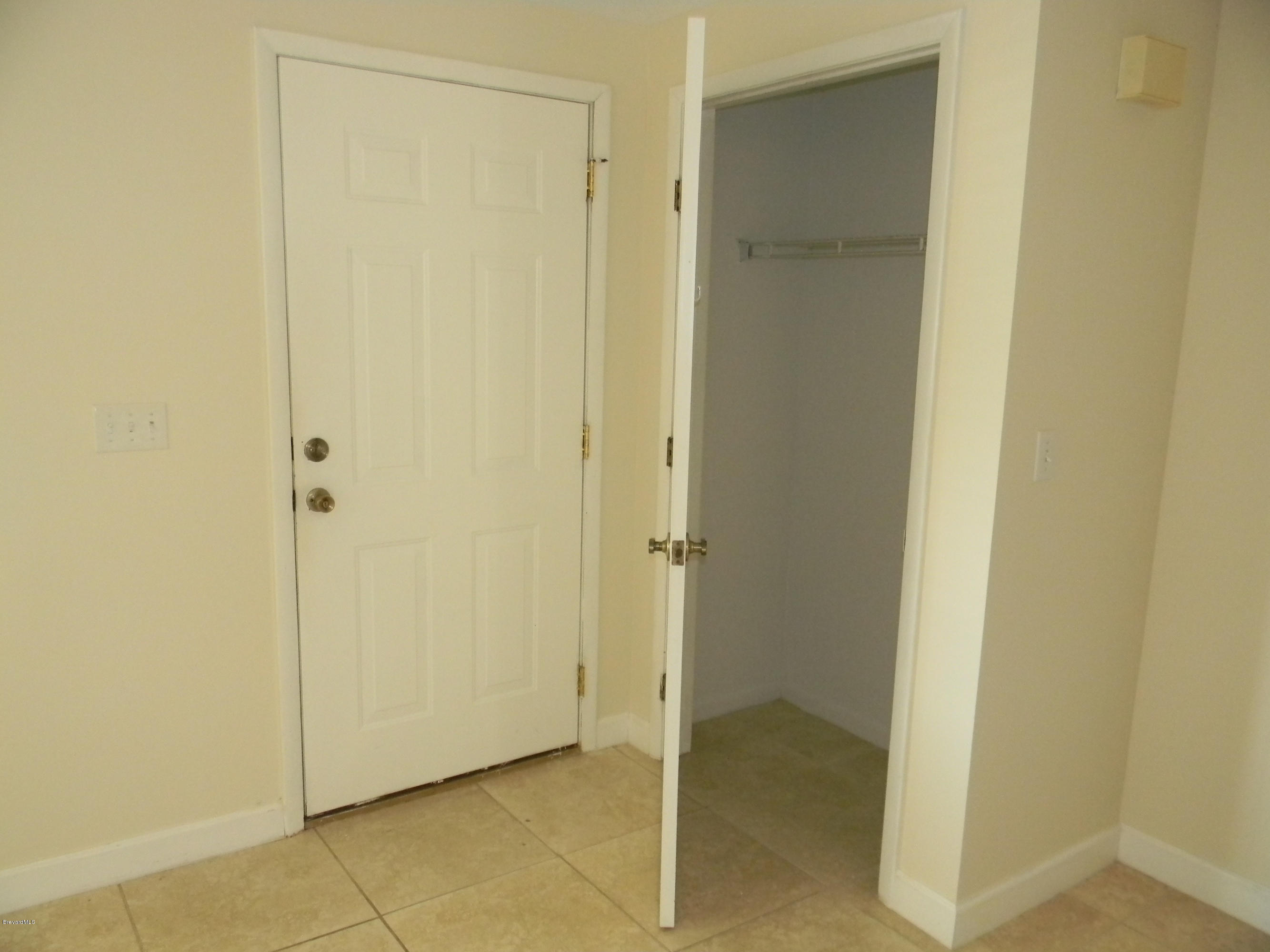 1880 Murrell Road, Unit 22 Rockledge, FL 32955 - Photo 4 of 19 Large coat closet/storage