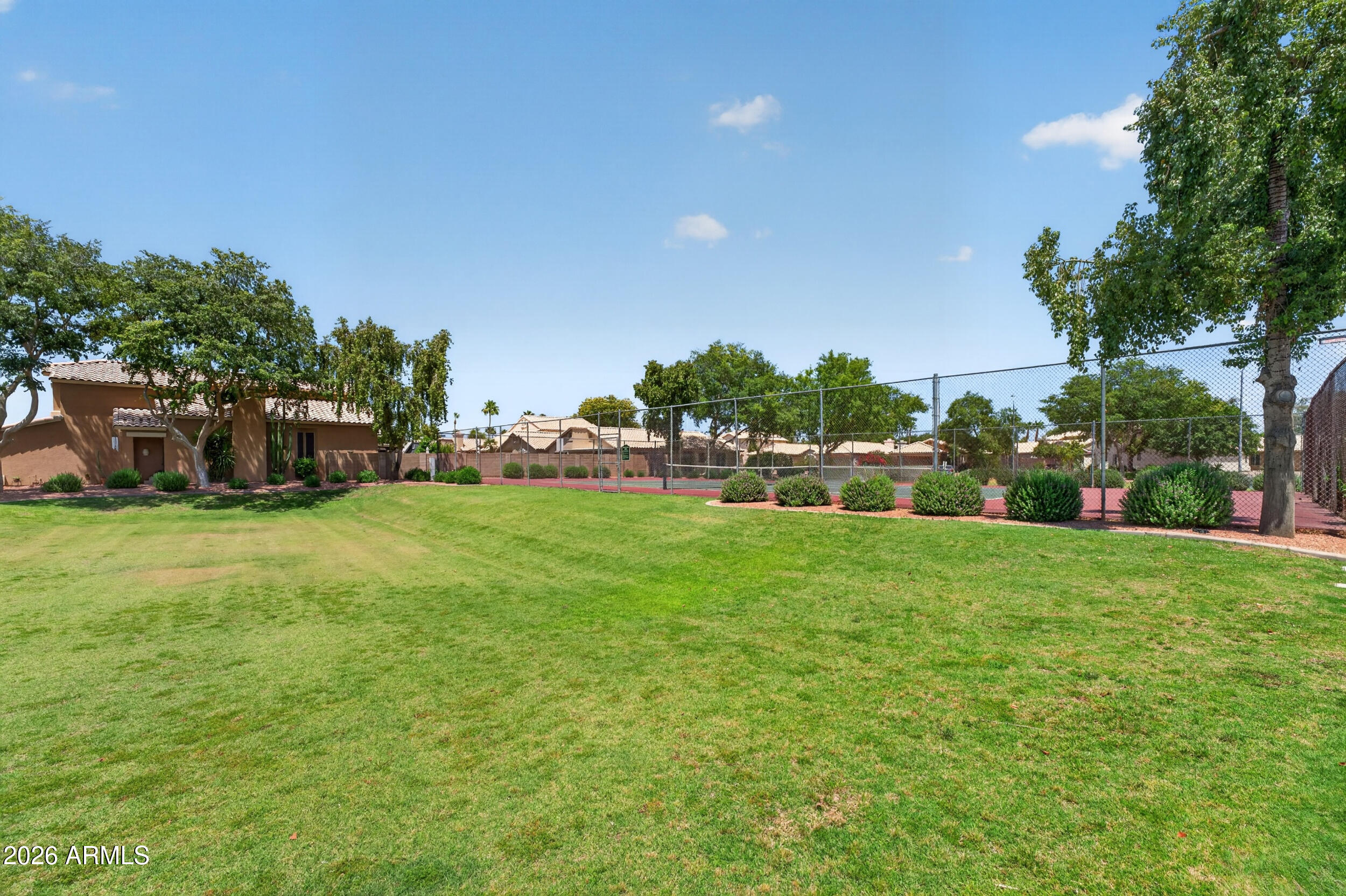 4729 West Monterey Street Chandler, AZ 85226 - Photo 40 of 50 a view of yard with swimming pool and green space