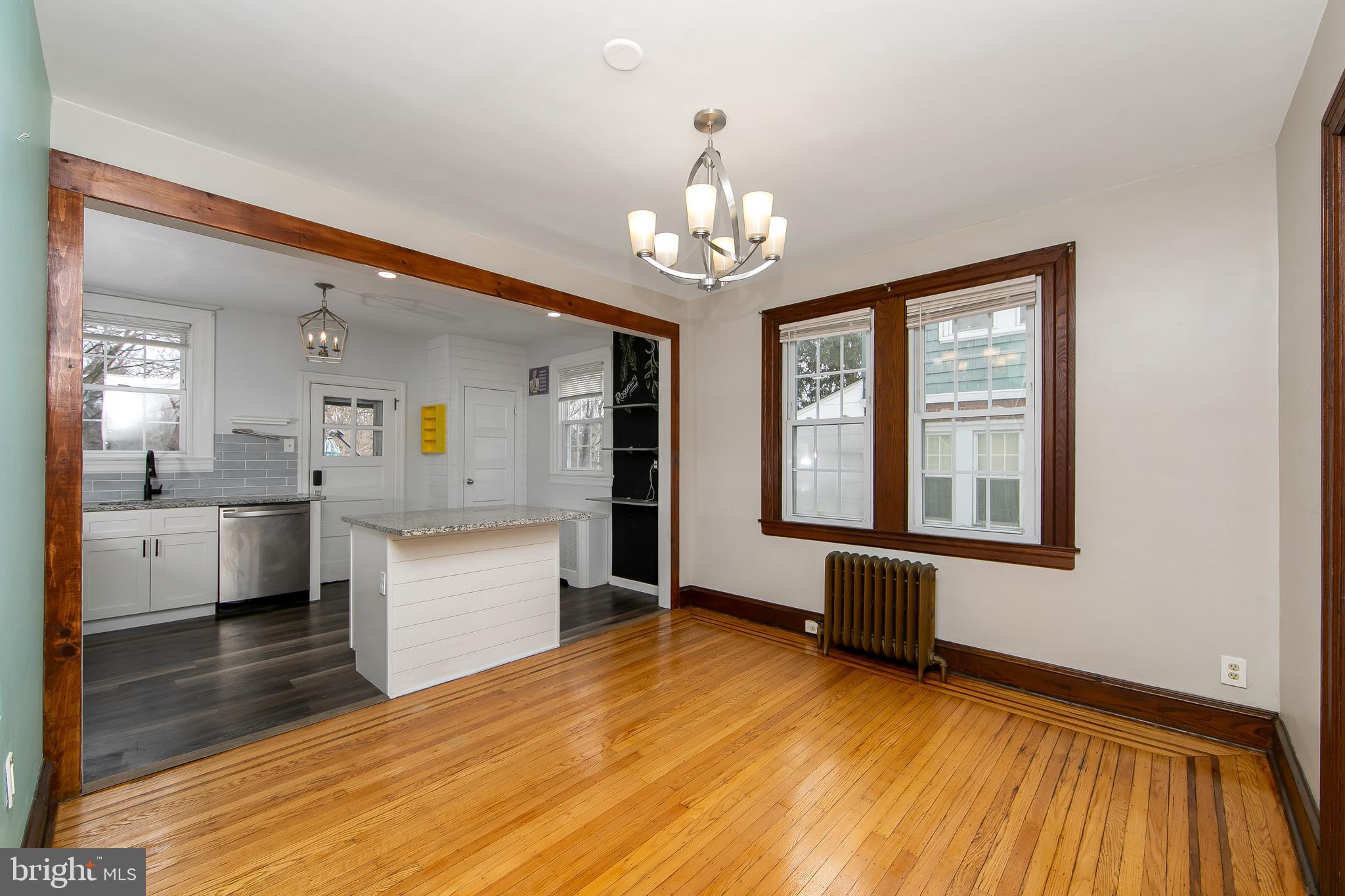 515 Ryers Avenue Cheltenham, PA 19012 - Photo 11 of 33 a view of kitchen with granite countertop cabinets a sink and dishwasher