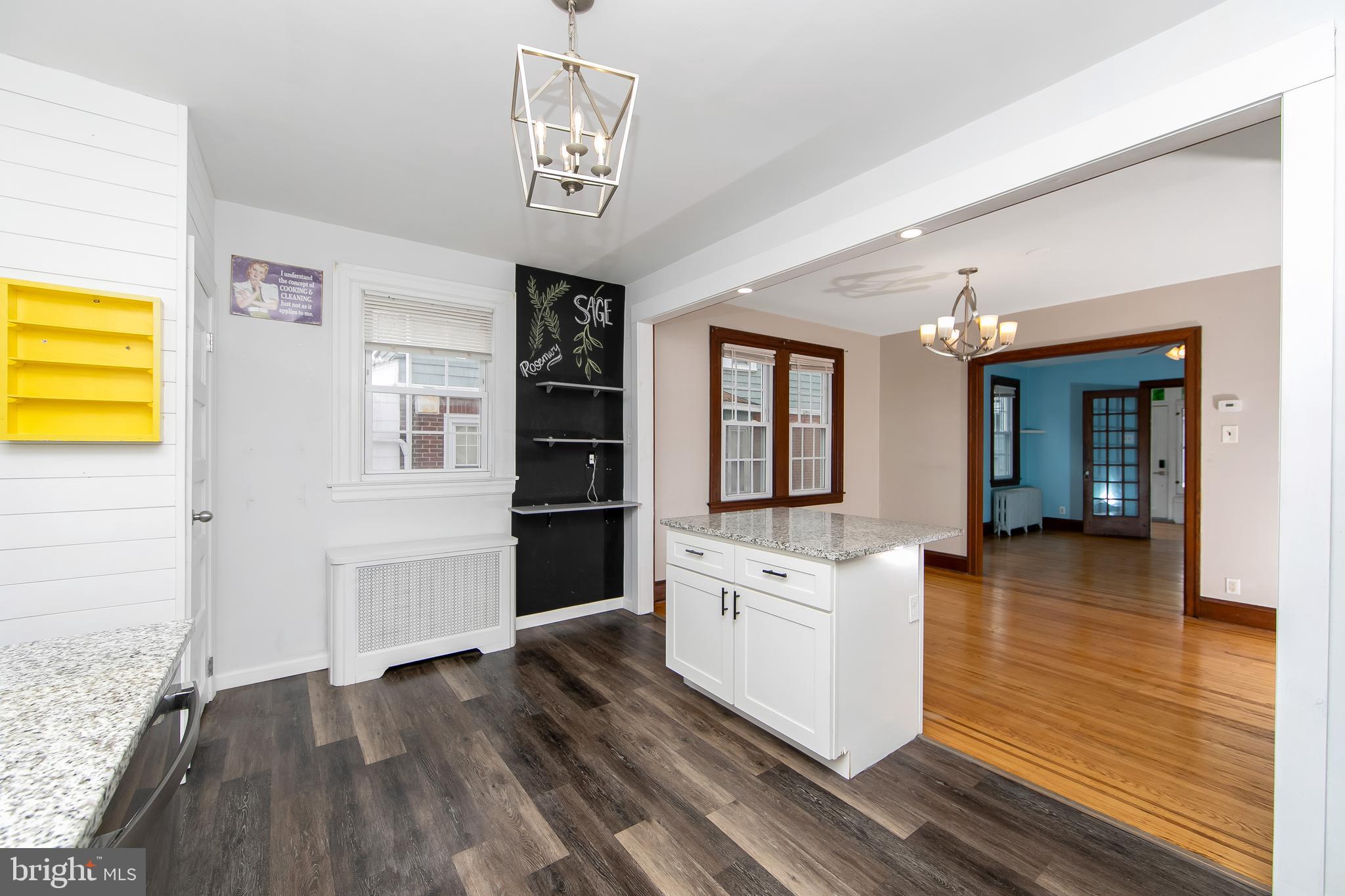 515 Ryers Avenue Cheltenham, PA 19012 - Photo 15 of 33 a kitchen with stainless steel appliances granite countertop a stove and a refrigerator