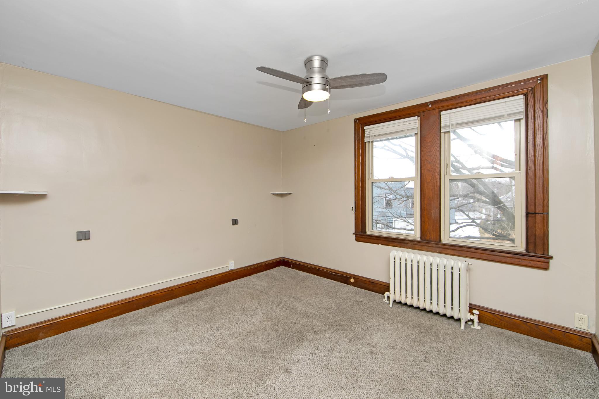 515 Ryers Avenue Cheltenham, PA 19012 - Photo 20 of 33 a view of an empty room with a window