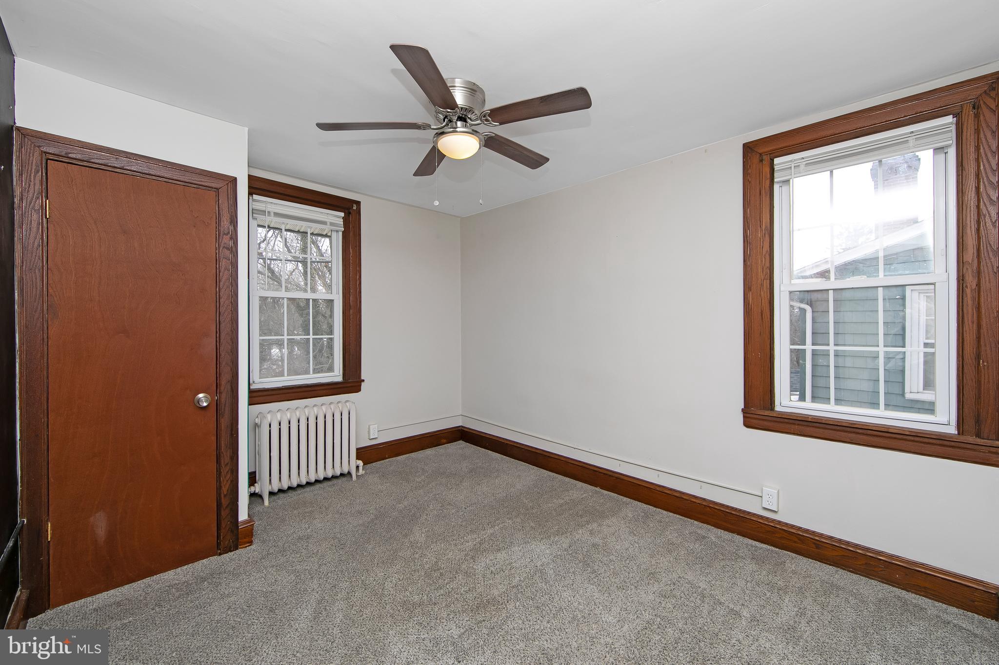 515 Ryers Avenue Cheltenham, PA 19012 - Photo 24 of 33 an empty room with windows and closet