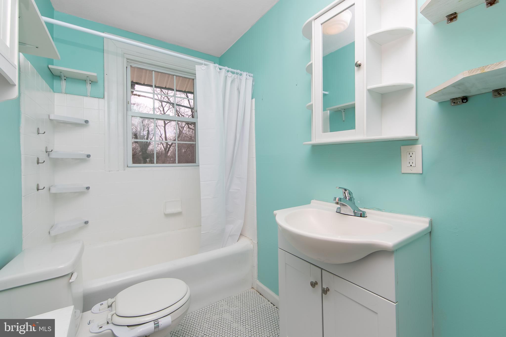 515 Ryers Avenue Cheltenham, PA 19012 - Photo 26 of 33 a bathroom with a sink toilet and shower