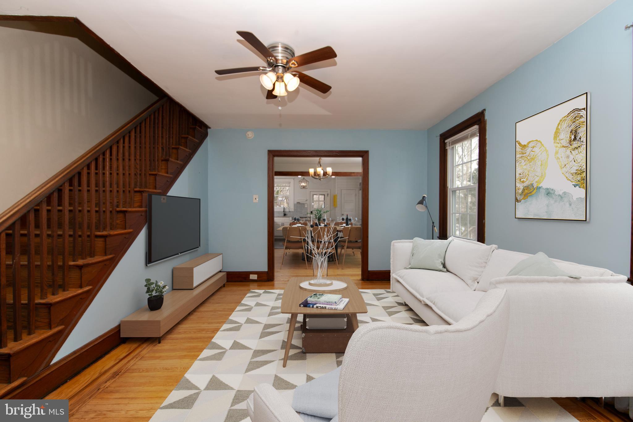 515 Ryers Avenue Cheltenham, PA 19012 - Photo 6 of 33 a living room with furniture and a large window