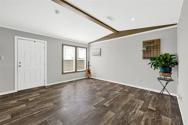 a kitchen with stainless steel appliances a refrigerator stove microwave and cabinets