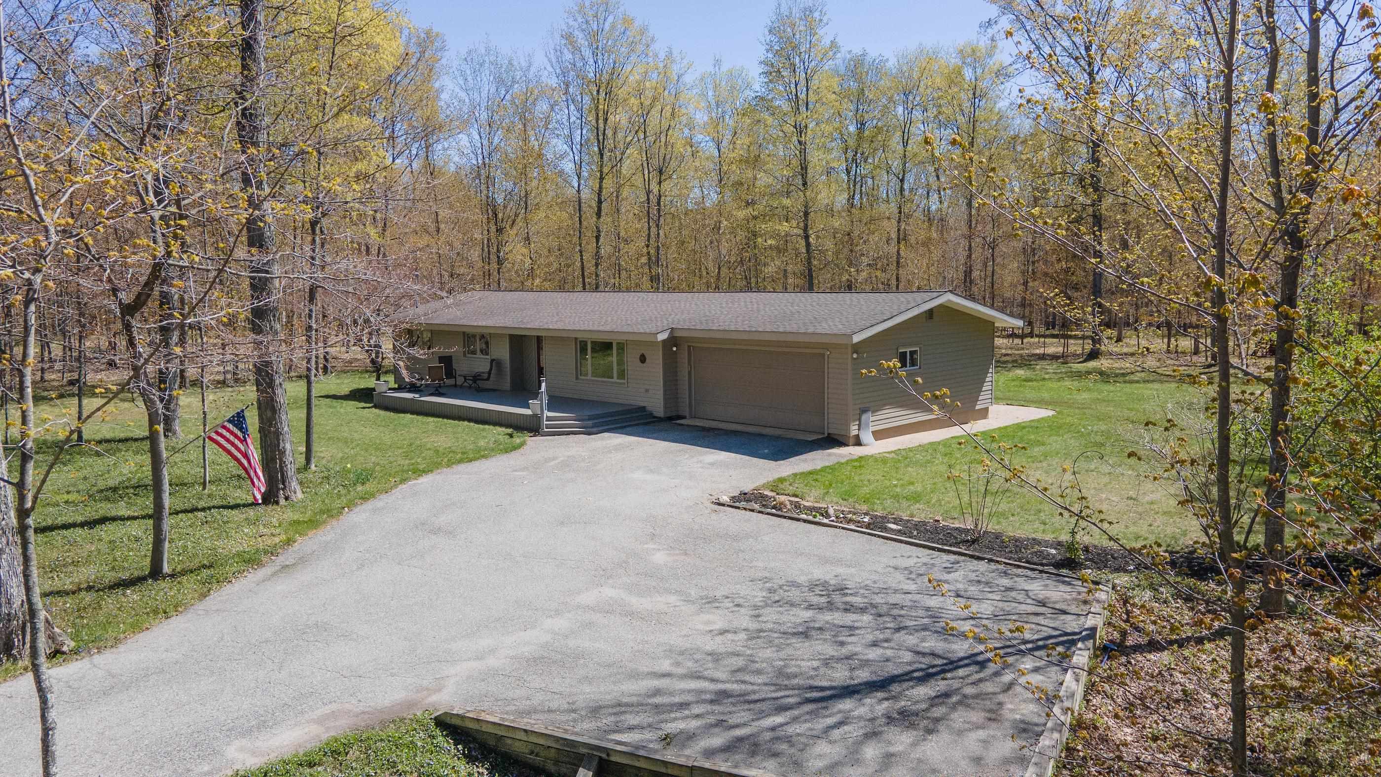 3189 West Trumbull Road Maple City, MI 49664 - Photo 1 of 35