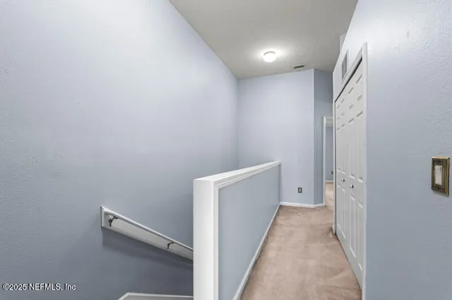 a view of kitchen and utility room