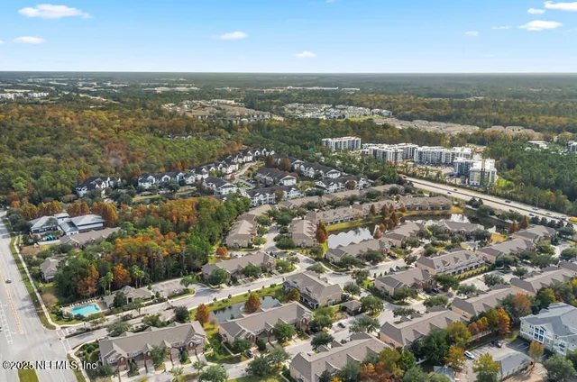 an aerial view of residential building with outdoor space