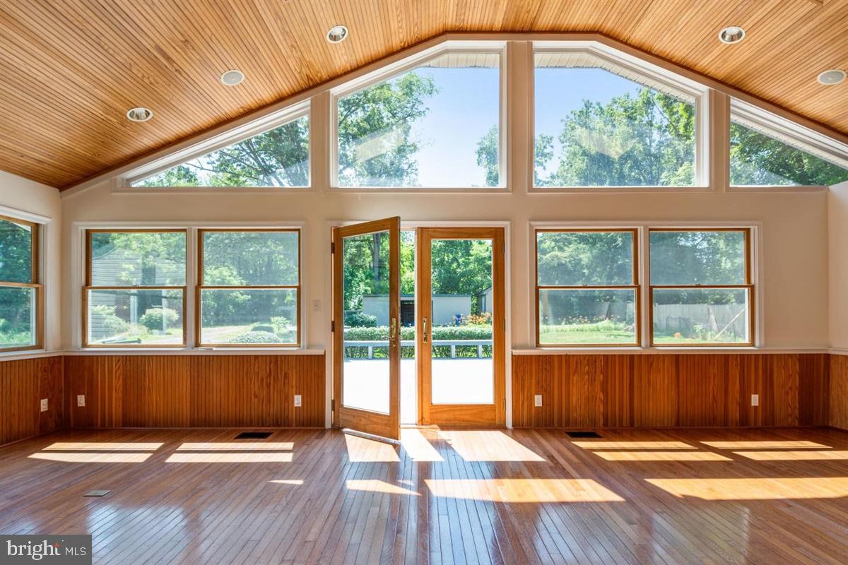 15929 Attleboro Road Silver Spring, MD 20905 - Photo 17 of 46 French doors leading out to huge trex deck