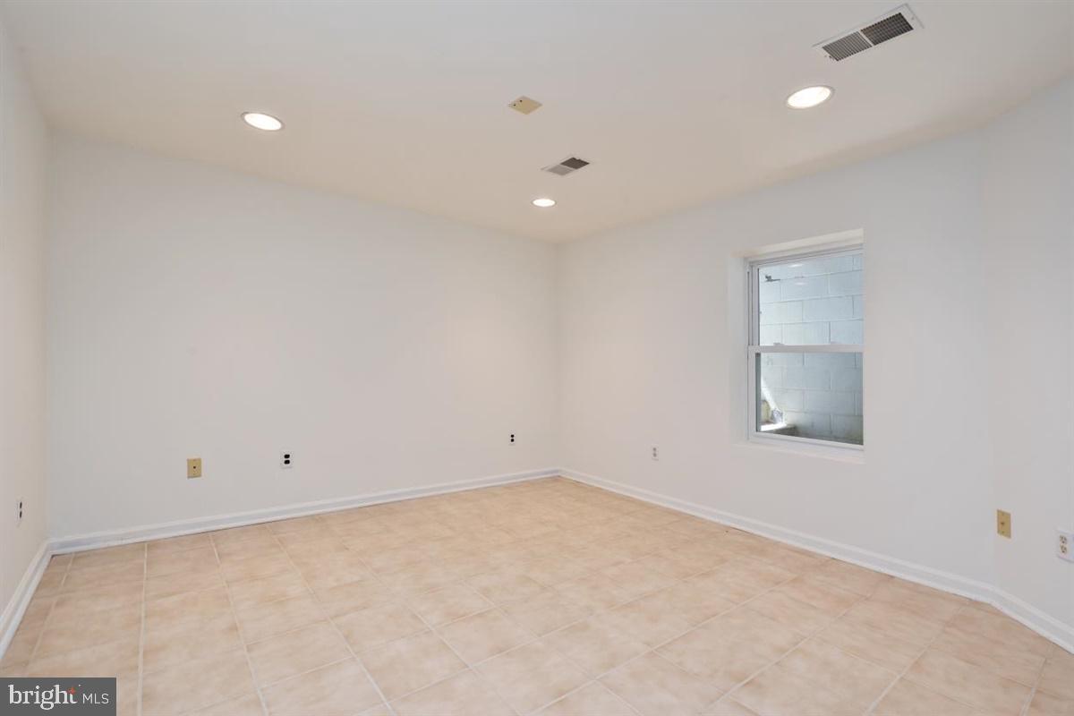 15929 Attleboro Road Silver Spring, MD 20905 - Photo 32 of 46 Basement bedroom