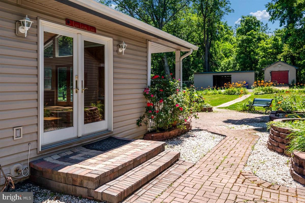15929 Attleboro Road Silver Spring, MD 20905 - Photo 37 of 46 Stone patio and walk areas