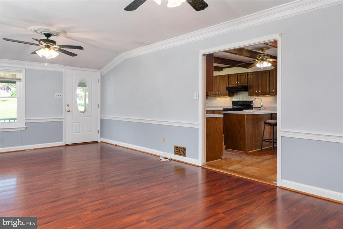 15929 Attleboro Road Silver Spring, MD 20905 - Photo 9 of 46 Living Room to Kitchen view