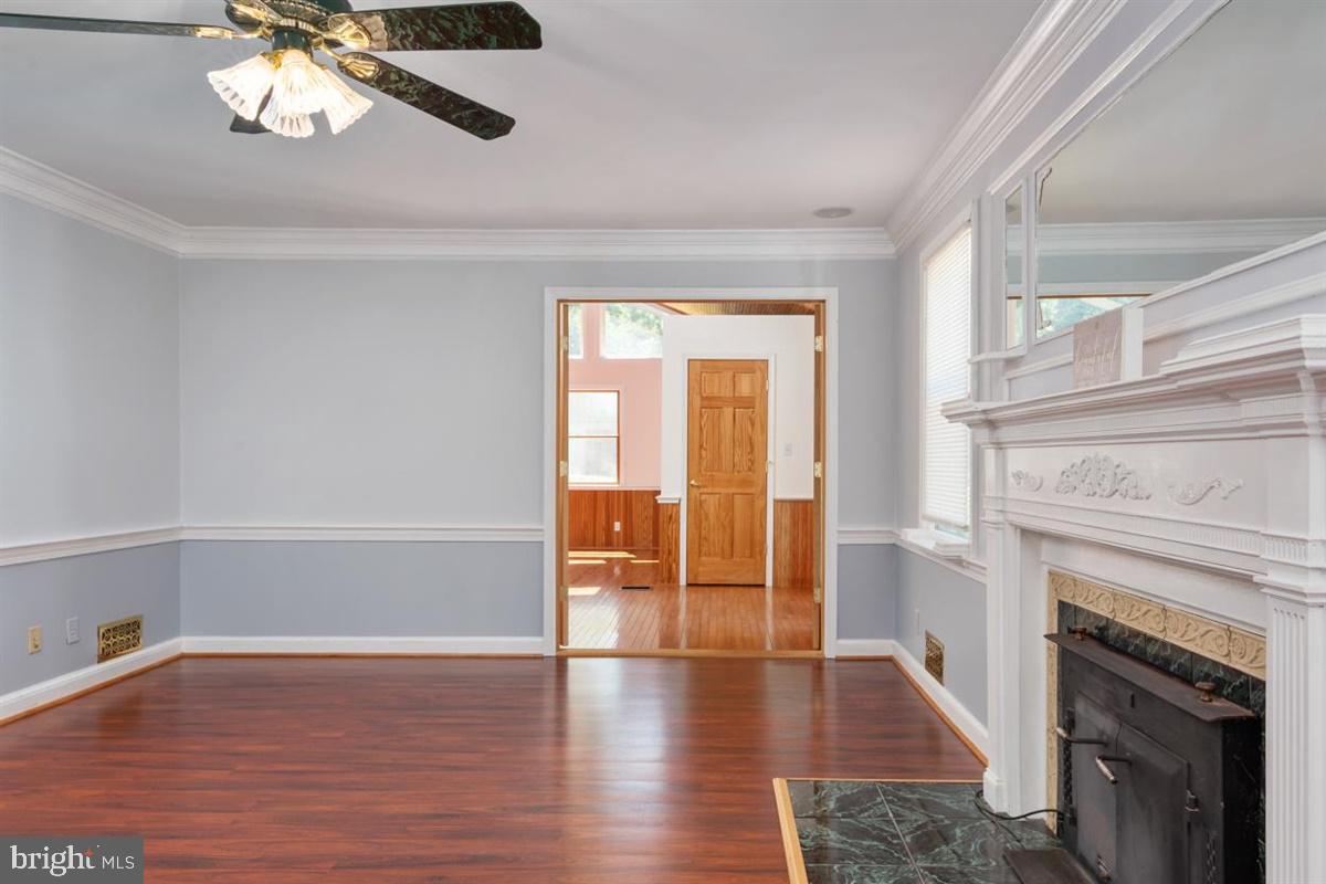 15929 Attleboro Road Silver Spring, MD 20905 - Photo 10 of 46 Living Room to Great Room view w/ french doors