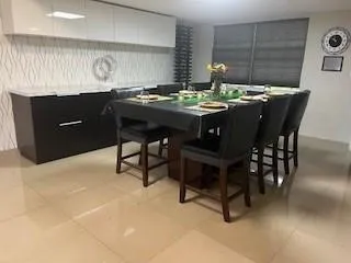 a bed room with a bed and a television