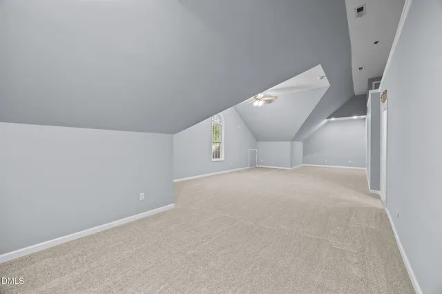 a view of a livingroom with a ceiling fan