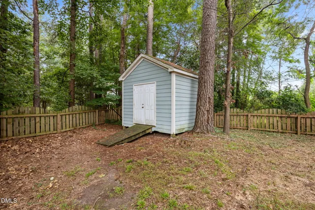 a view of backyard with green space