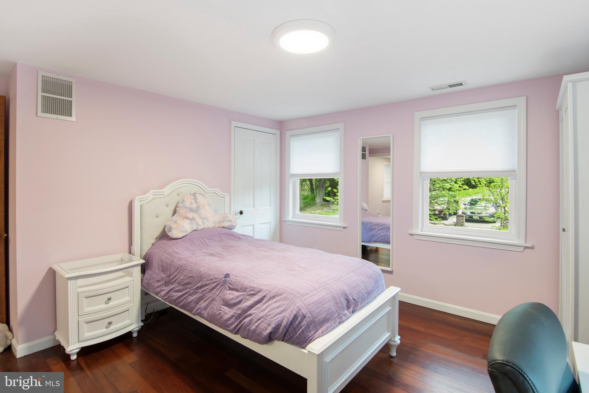 18708 York Road Parkton, MD 21120 - Photo 51 of 59 a bedroom with a bed and a chair