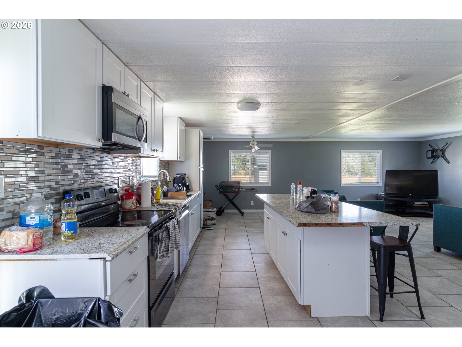 80649 Crooked Road Irrigon, OR 97844 - Photo 7 of 21 a kitchen with sink cabinets and appliances
