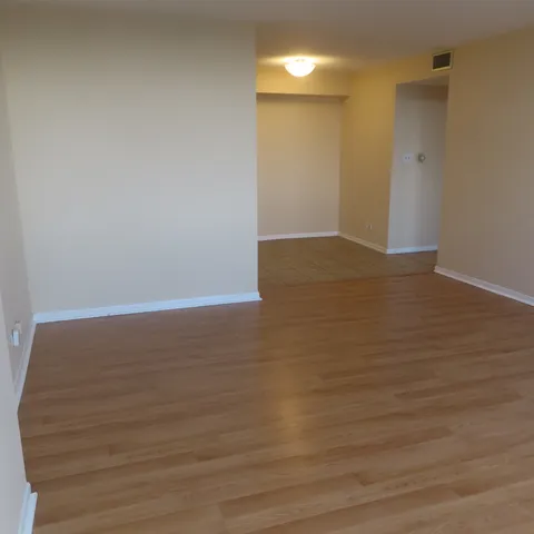 a white refrigerator freezer sitting inside of a kitchen