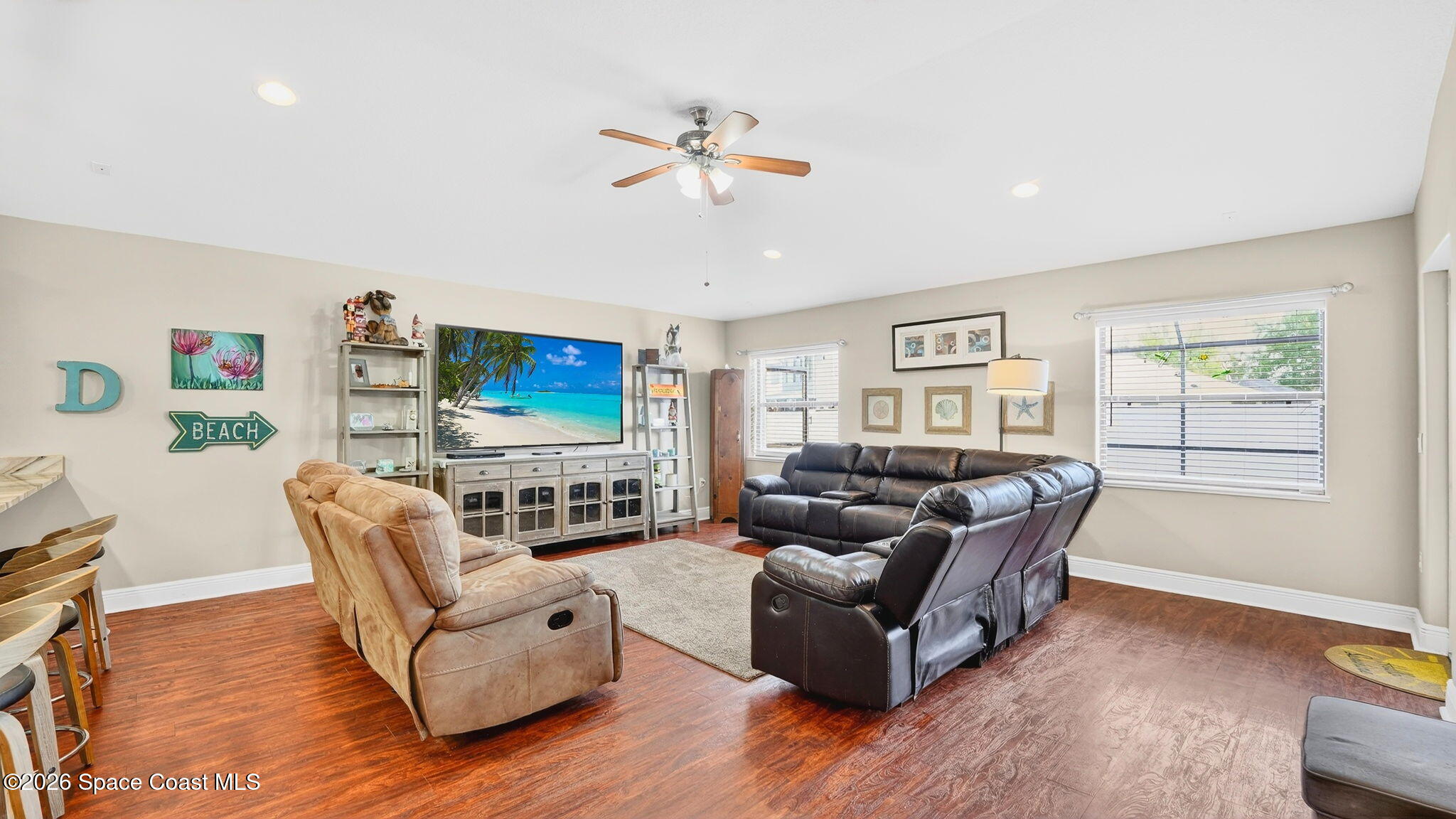 4082 Brantley Circle Rockledge, FL 32955 - Photo 11 of 53 a living room with furniture and a flat screen tv