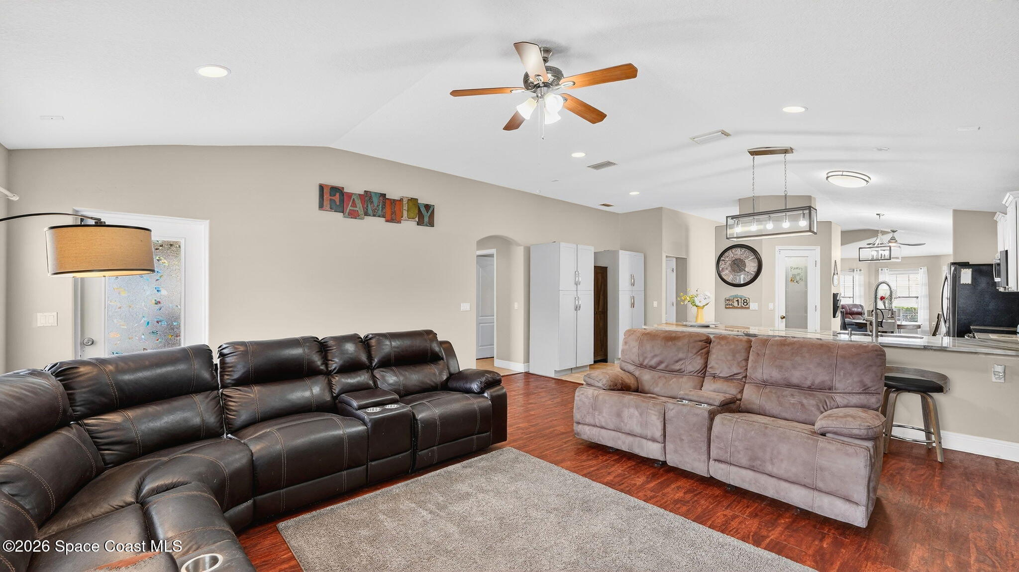 4082 Brantley Circle Rockledge, FL 32955 - Photo 13 of 53 a living room with furniture and kitchen view