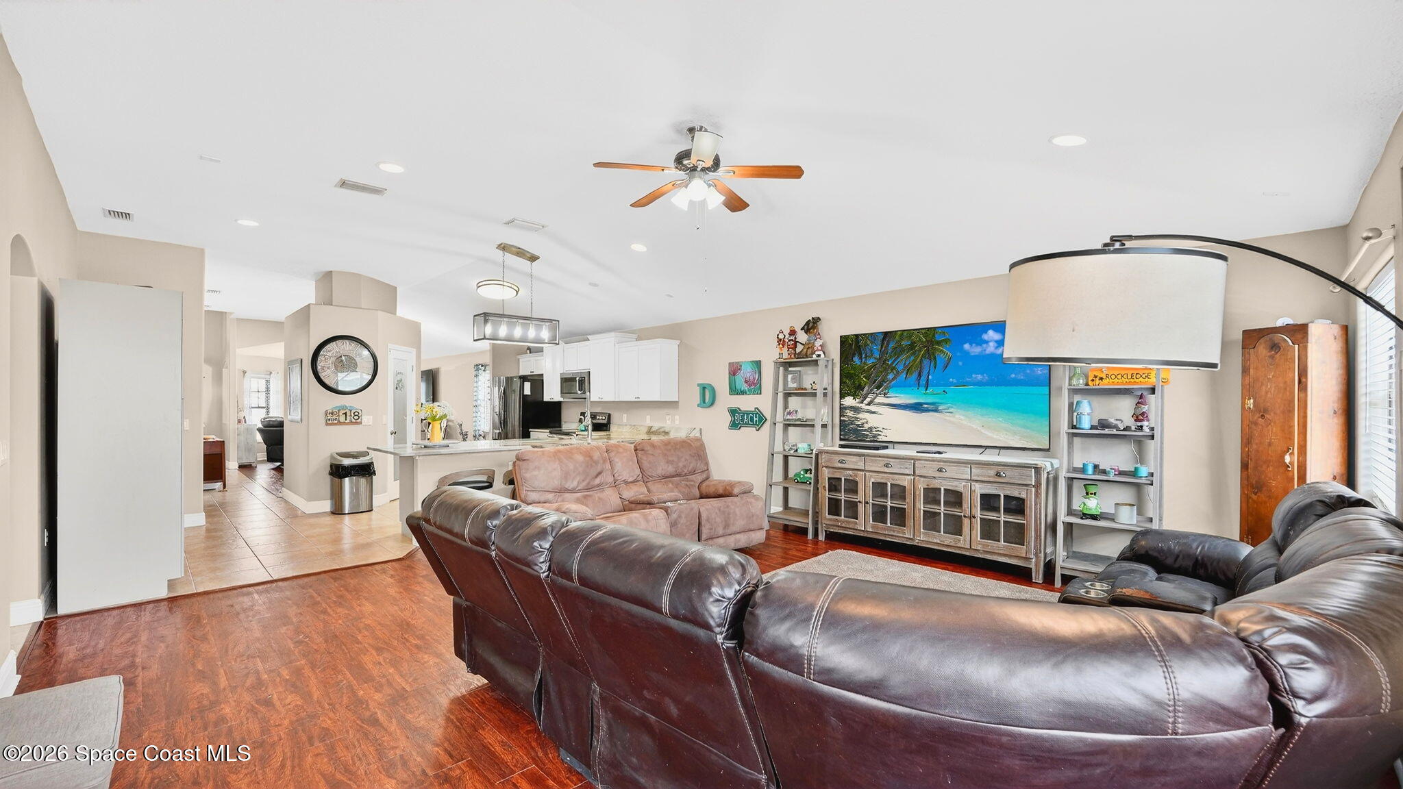 4082 Brantley Circle Rockledge, FL 32955 - Photo 14 of 53 a living room with furniture and a flat screen tv