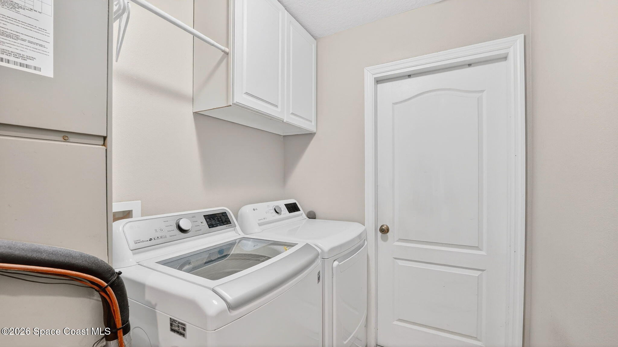 4082 Brantley Circle Rockledge, FL 32955 - Photo 31 of 53 a utility room with dryer and washer