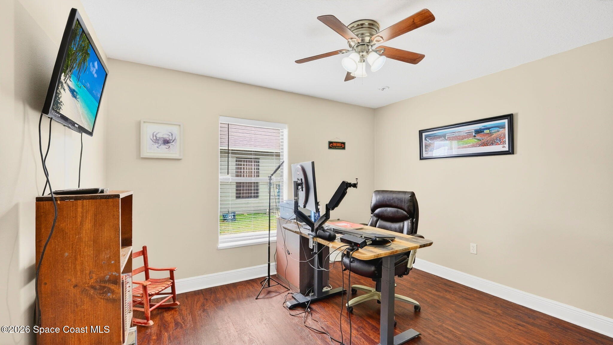 4082 Brantley Circle Rockledge, FL 32955 - Photo 34 of 53 a view of a workspace with furniture and wooden floor