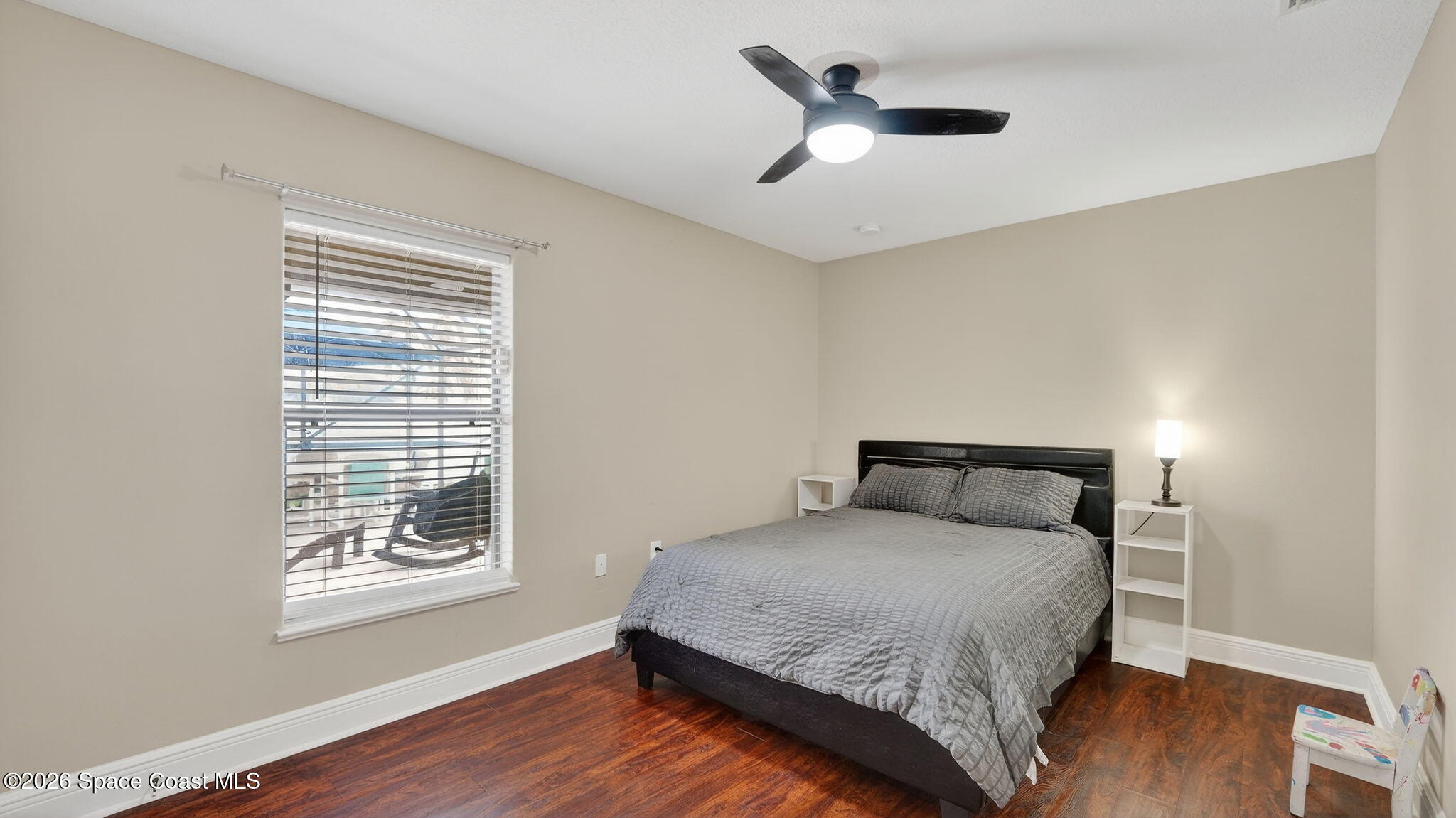 4082 Brantley Circle Rockledge, FL 32955 - Photo 35 of 53 a bedroom with a bed and a window