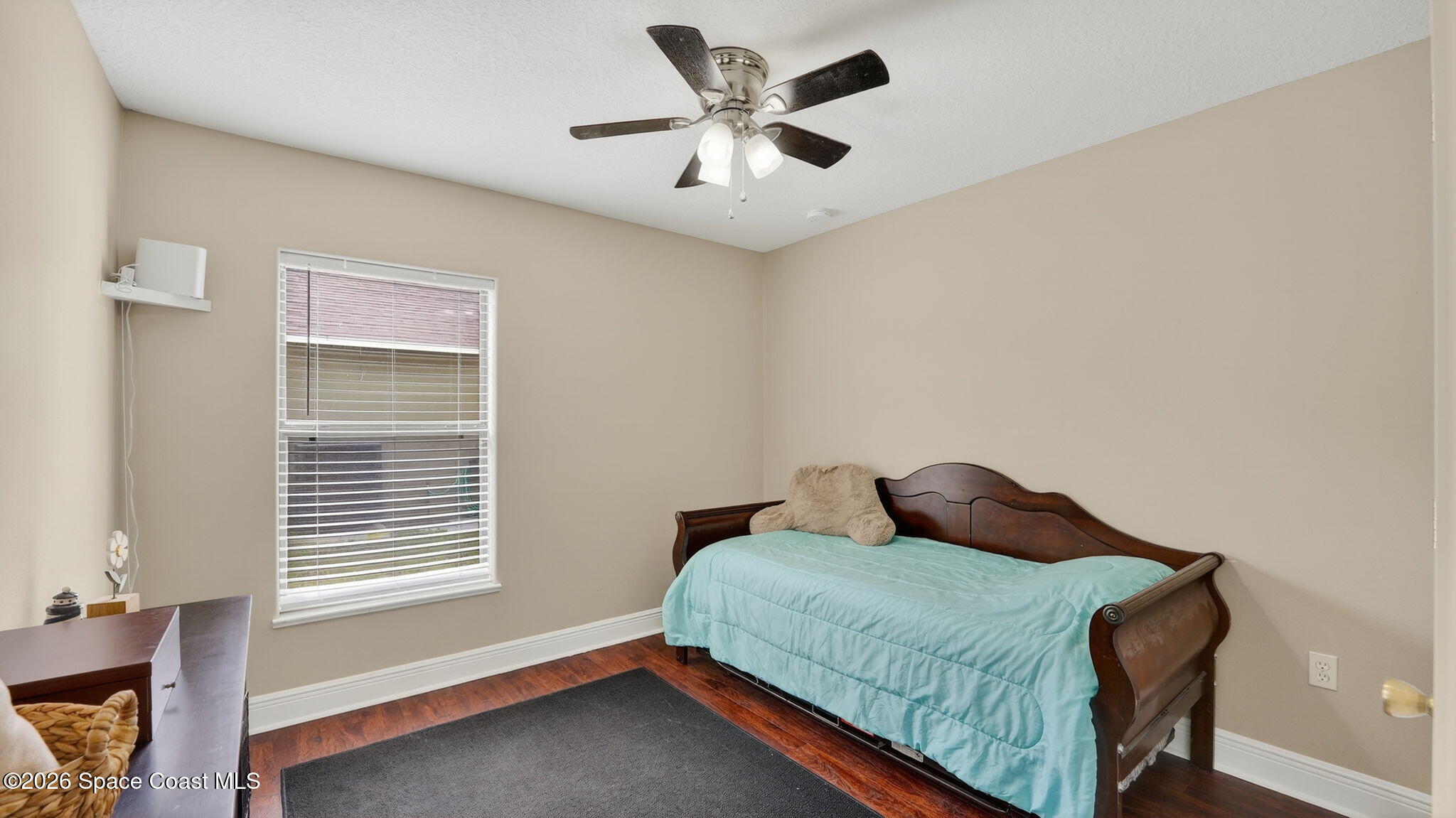 4082 Brantley Circle Rockledge, FL 32955 - Photo 36 of 53 a bedroom with a bed and a window
