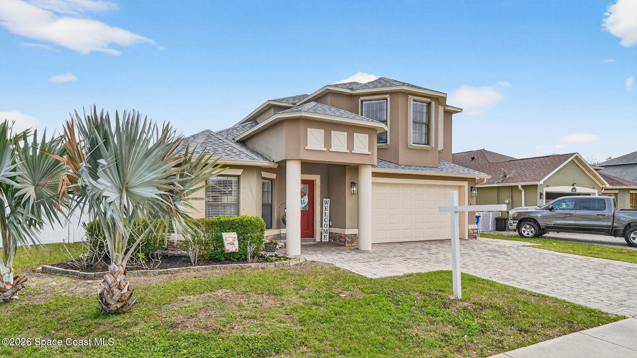 4082 Brantley Circle Rockledge, FL 32955 - Photo 39 of 53 a front view of a house with a yard