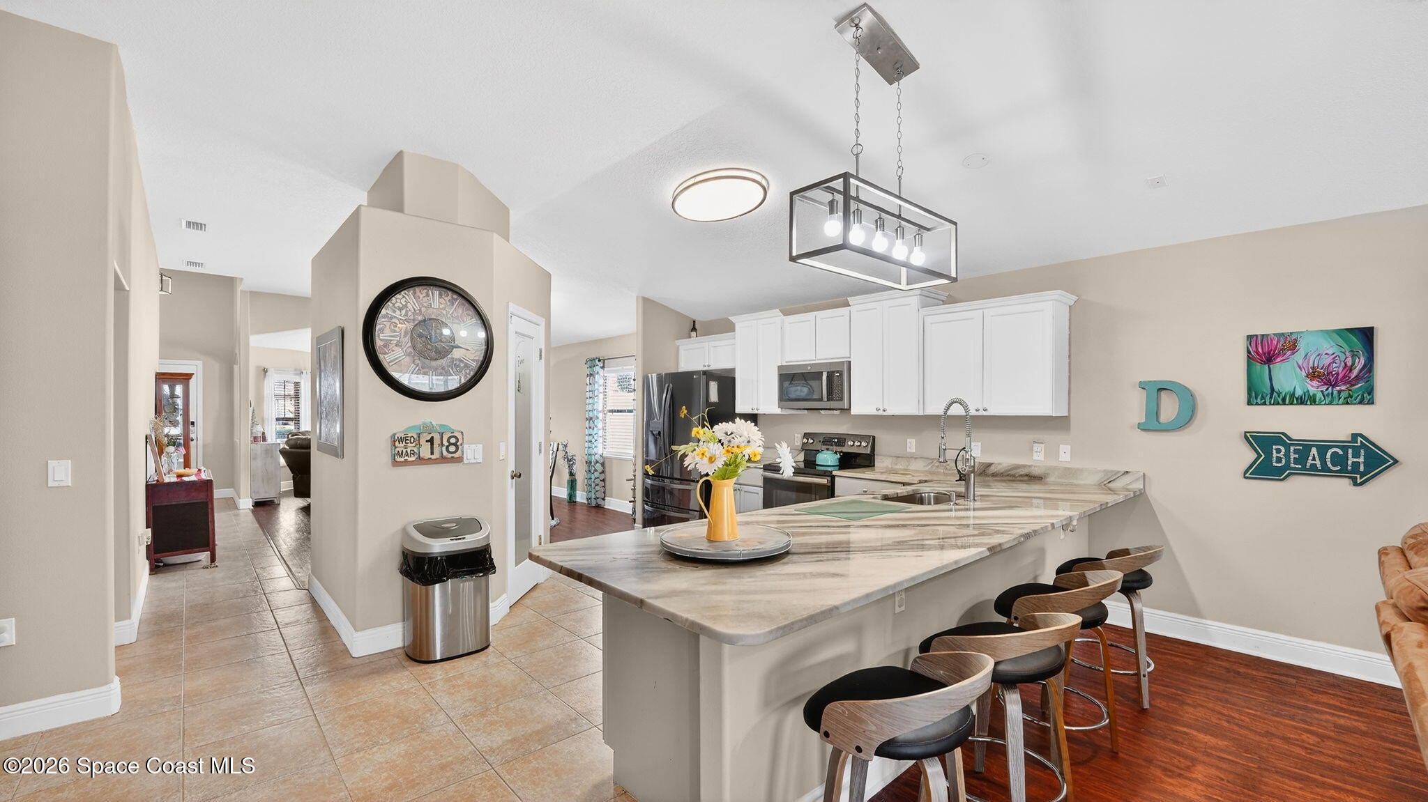 4082 Brantley Circle Rockledge, FL 32955 - Photo 4 of 53 a kitchen with a dining table and chairs