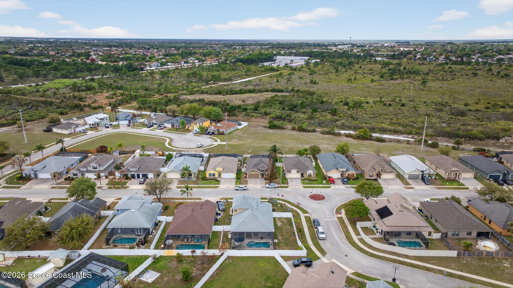 4082 Brantley Circle Rockledge, FL 32955 - Photo 47 of 53 an aerial view of residential houses with outdoor space