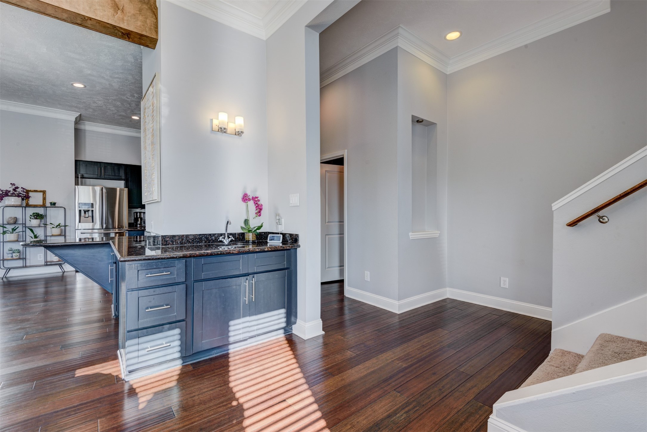 1124 West Dallas Street Houston, TX 77019 - Photo 12 of 28 a kitchen with wooden floors and wooden cabinets