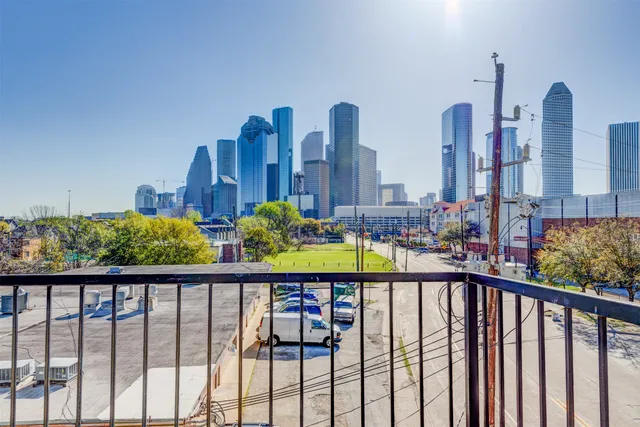 a city view from a balcony