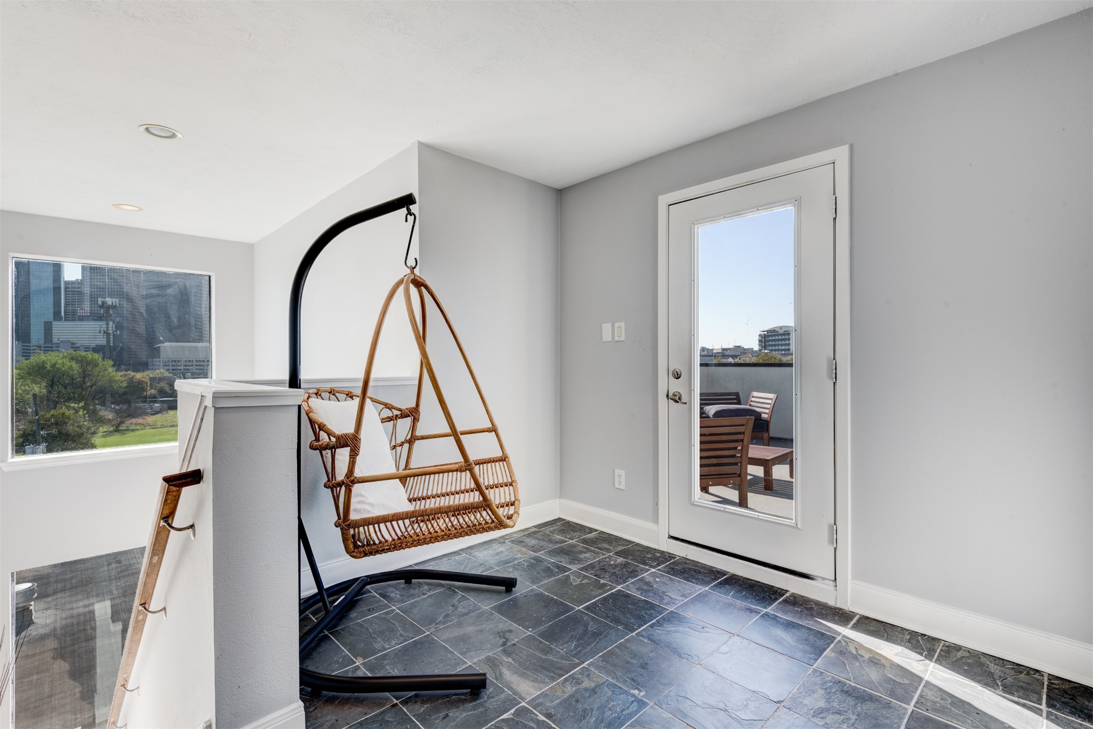 1124 West Dallas Street Houston, TX 77019 - Photo 22 of 28 a view of staircase with a rug
