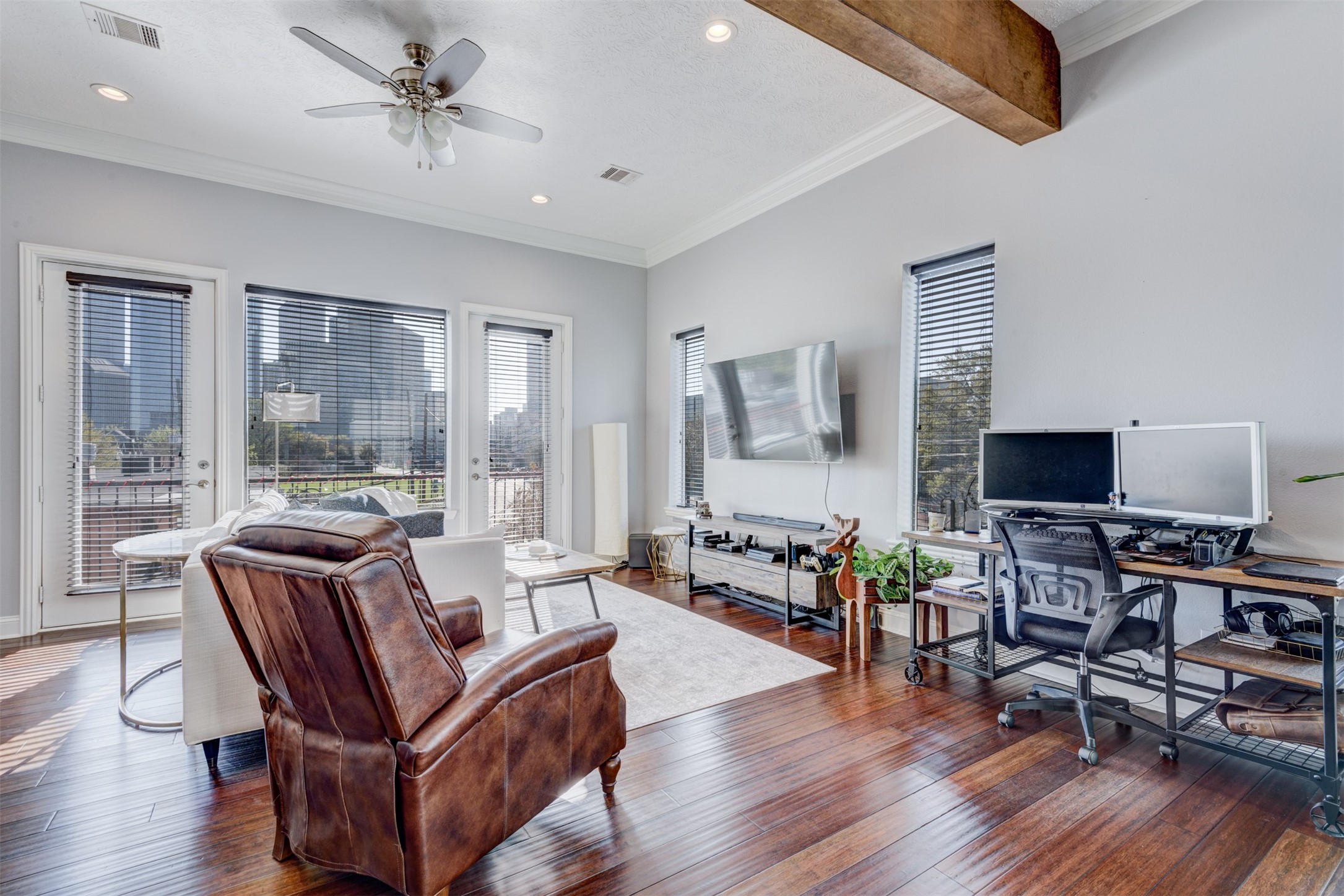 1124 West Dallas Street Houston, TX 77019 - Photo 4 of 28 a living room with furniture and a flat screen tv with wooden floor