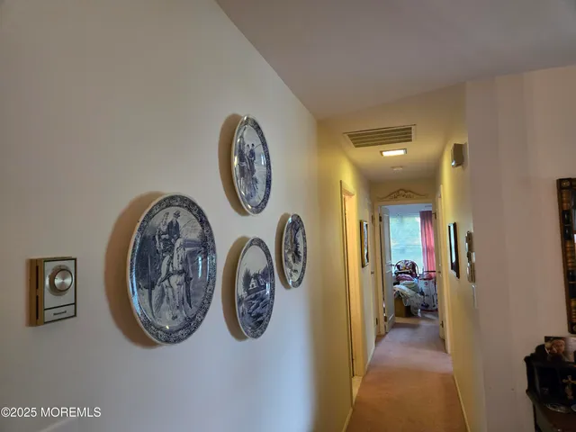 a view of a hallway with elevator