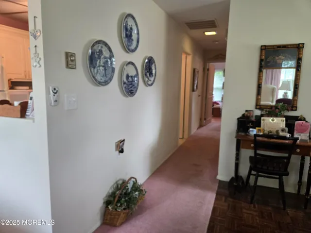 a view of a hallway with elevator