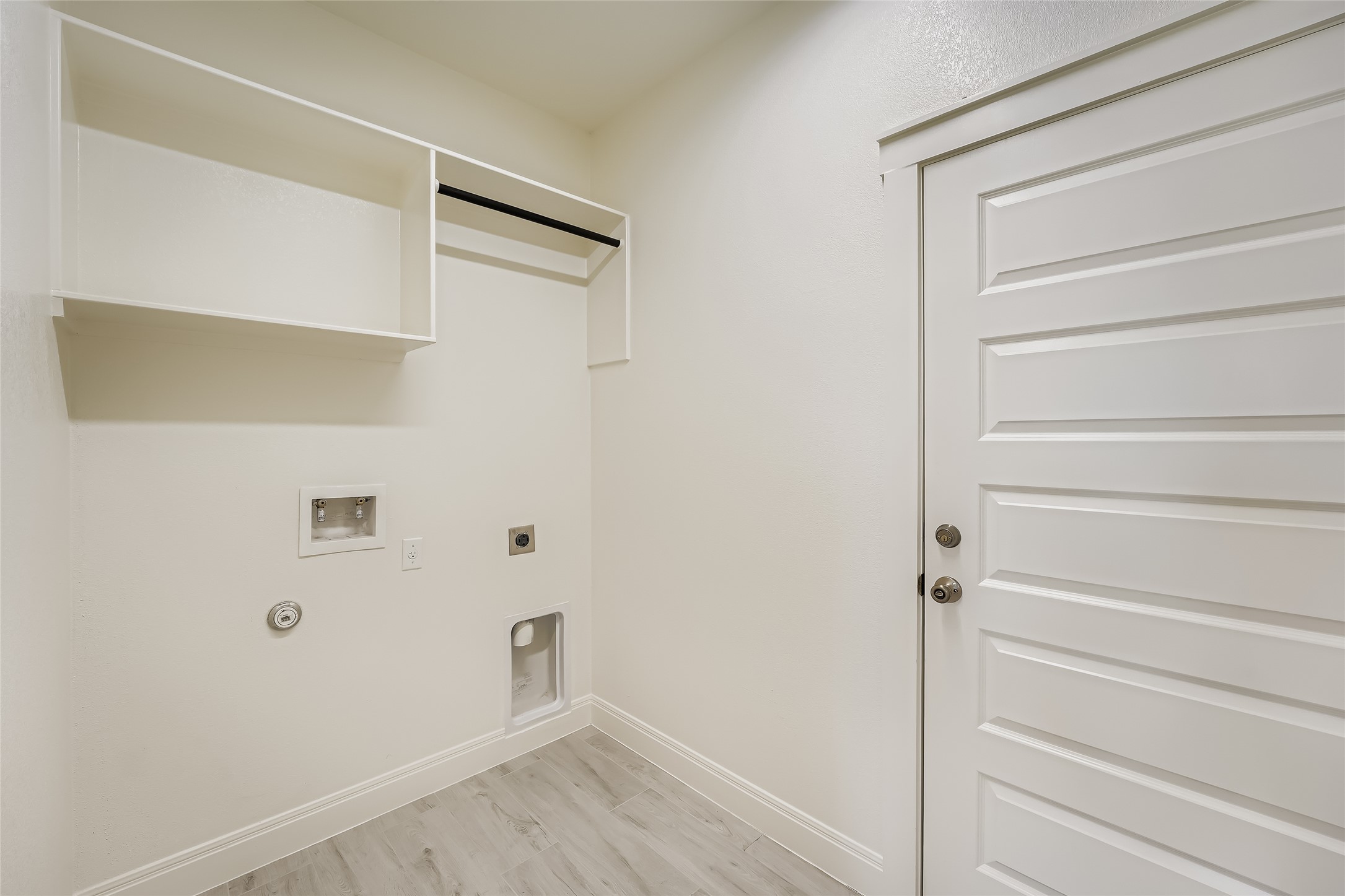 222 Arosa Drive Elgin, TX 78621 - Photo 37 of 40 a view of walk in closet with empty racks