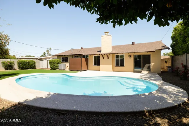 a view of outdoor space yard and swimming pool