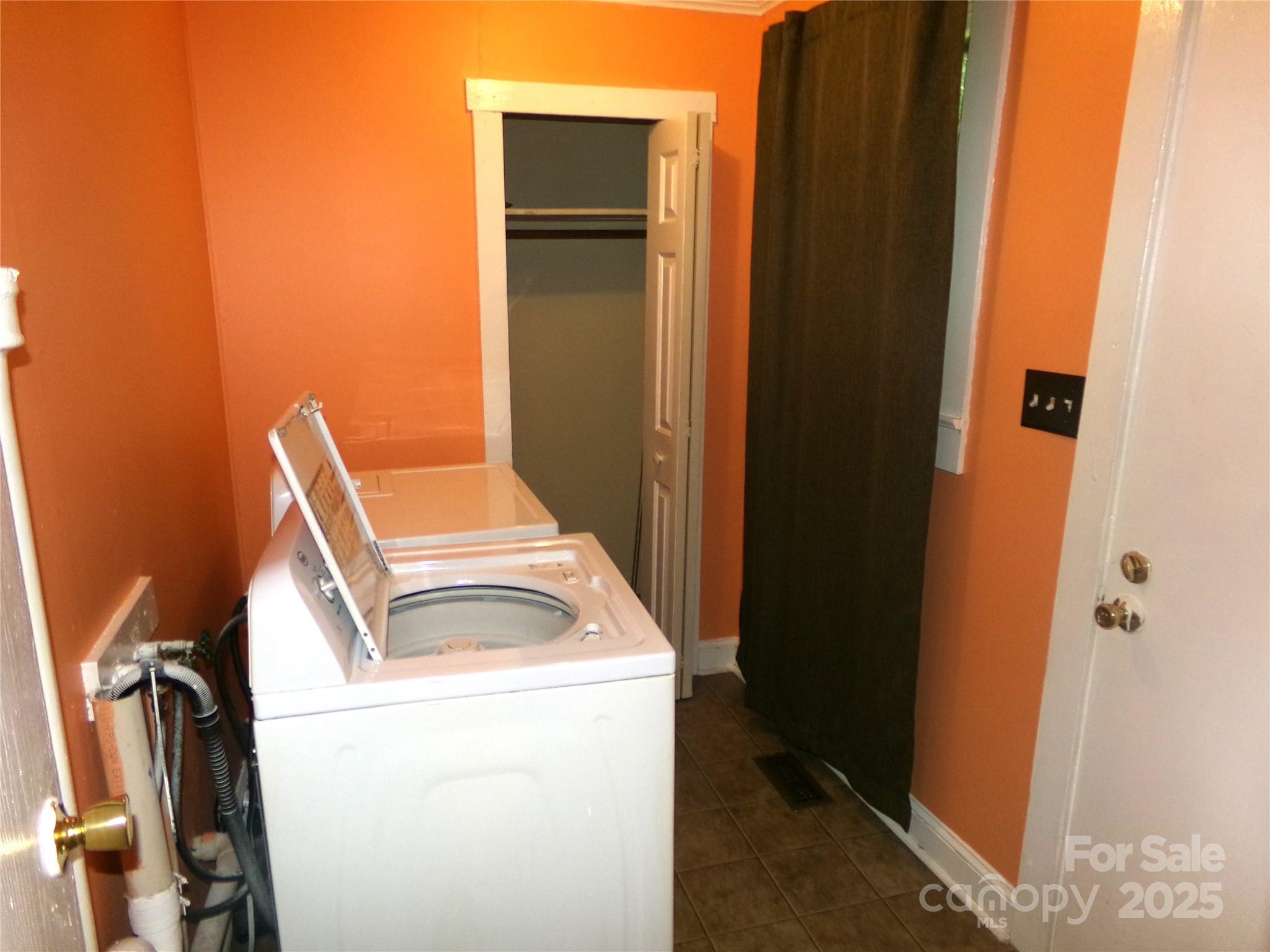 306 Dunlap Street Albemarle, NC 28001 - Photo 12 of 23 a utility room with dryer and washer