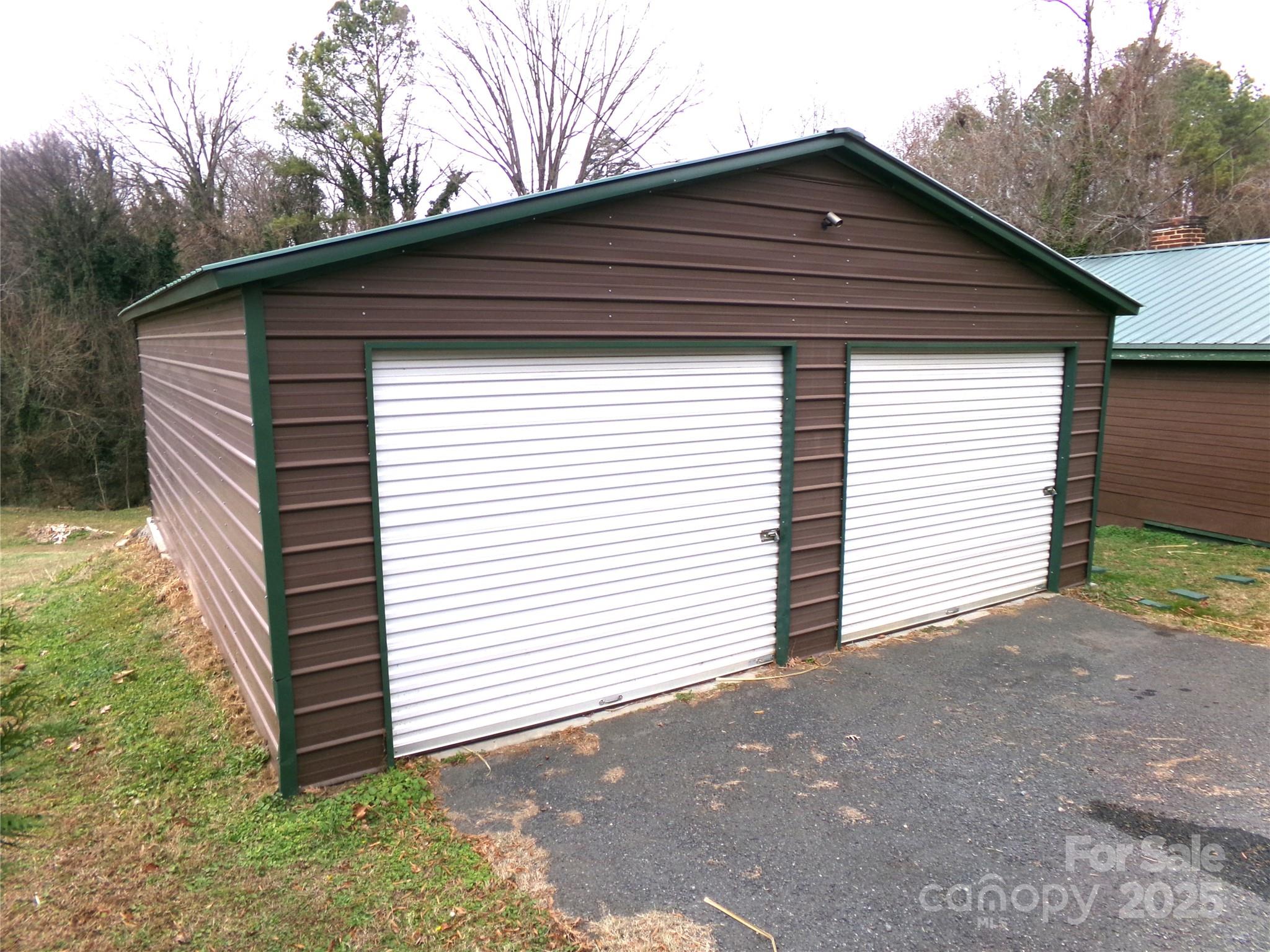 306 Dunlap Street Albemarle, NC 28001 - Photo 23 of 23 a small white house with a outdoor space