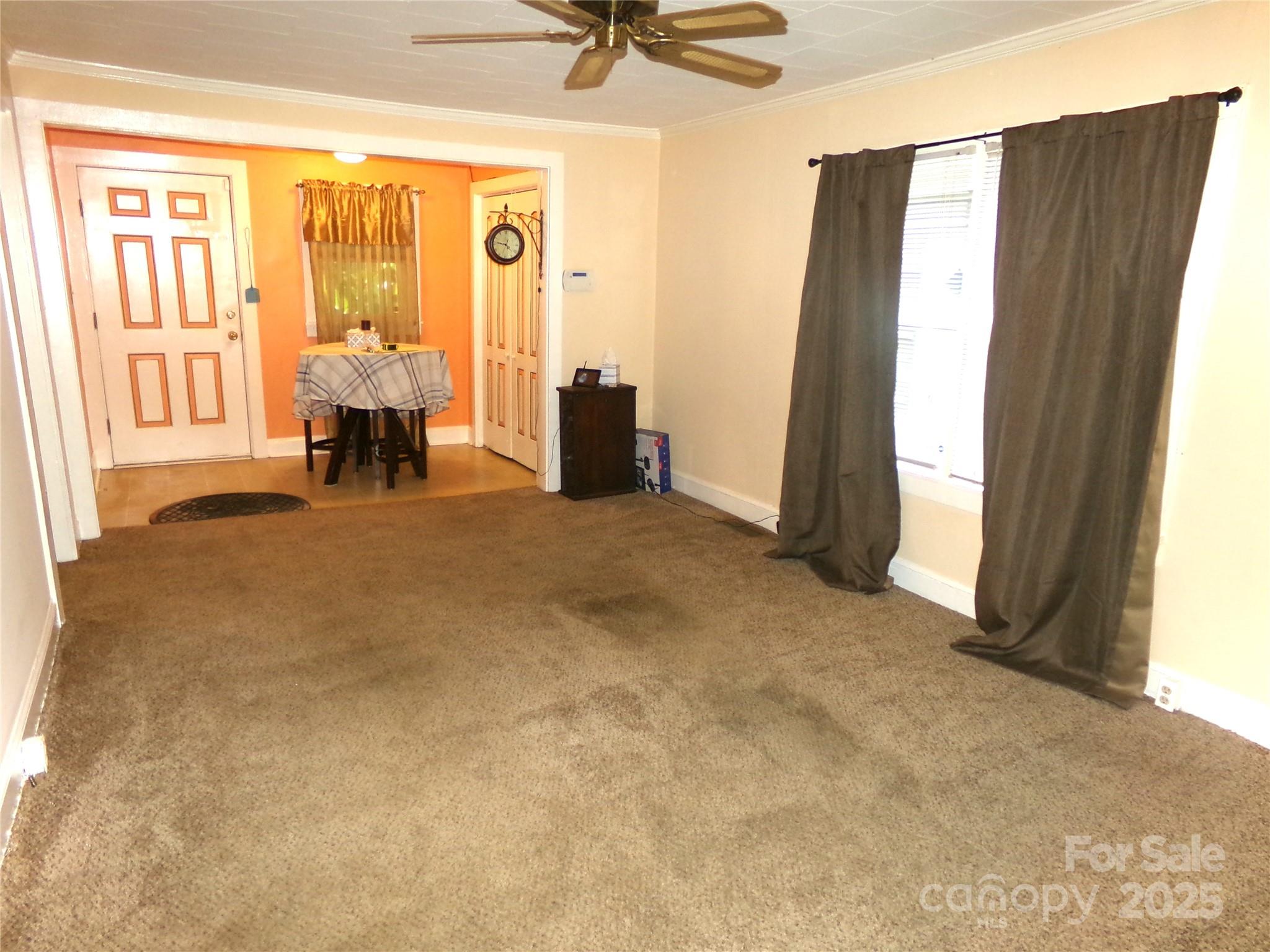 306 Dunlap Street Albemarle, NC 28001 - Photo 4 of 23 a view of a room with a large window