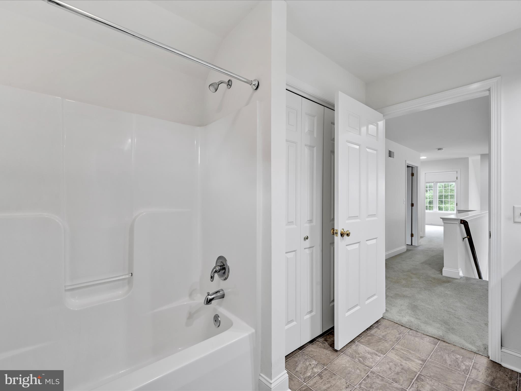 660 Woodfield Drive Lititz, PA 17543 - Photo 27 of 43 a bathroom with a bathtub and a shower