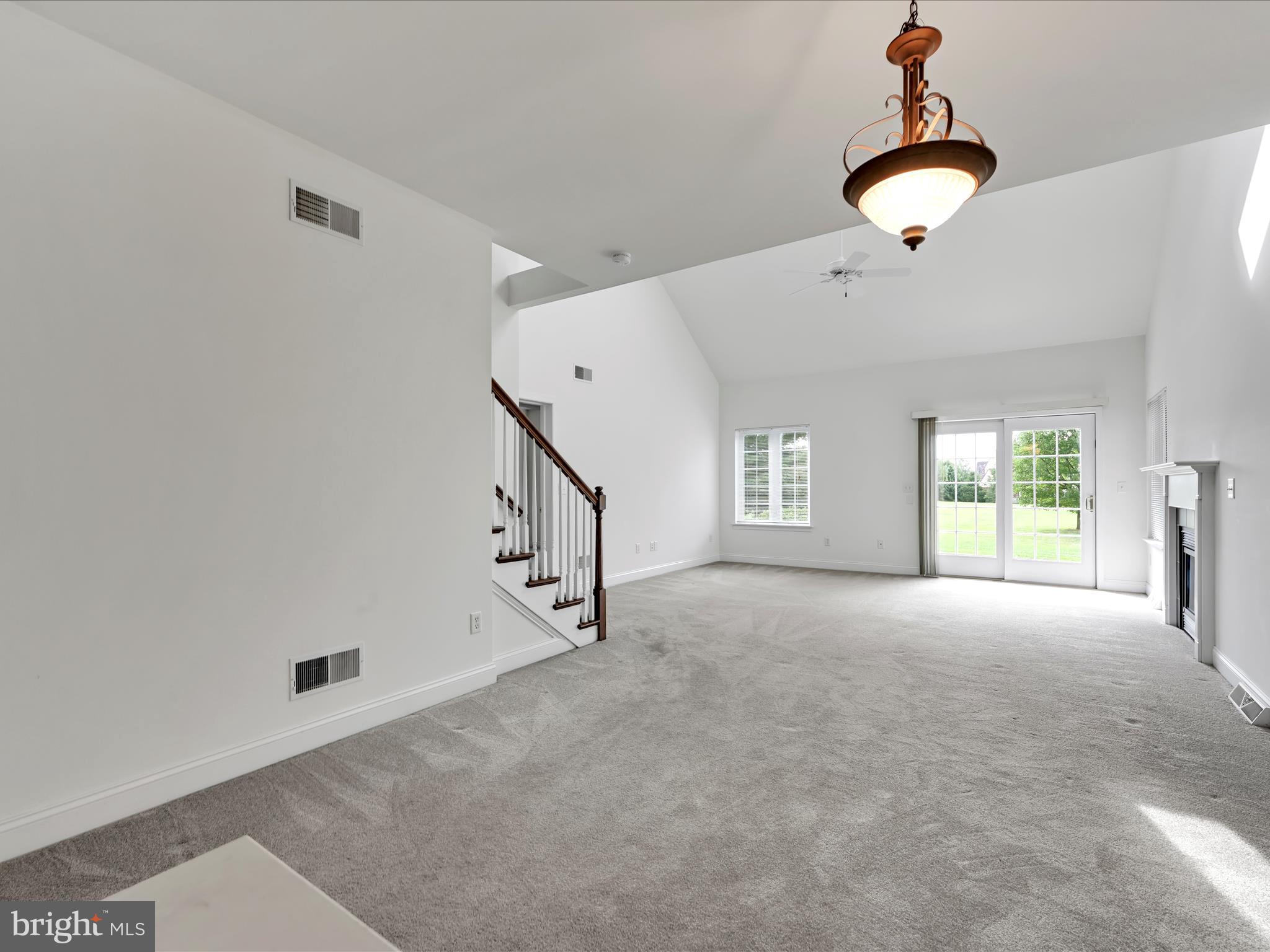 660 Woodfield Drive Lititz, PA 17543 - Photo 7 of 43 a view of an empty room with a window