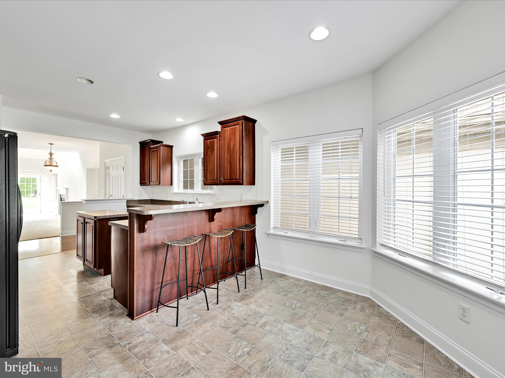 660 Woodfield Drive Lititz, PA 17543 - Photo 10 of 43 a living room with furniture and a open kitchen view