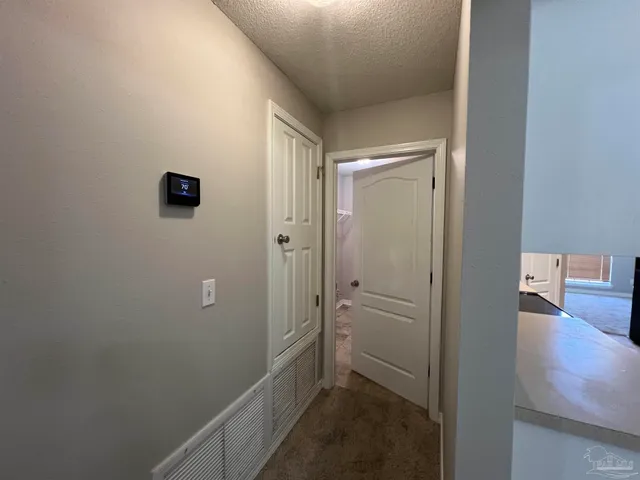 an empty room with a bathroom