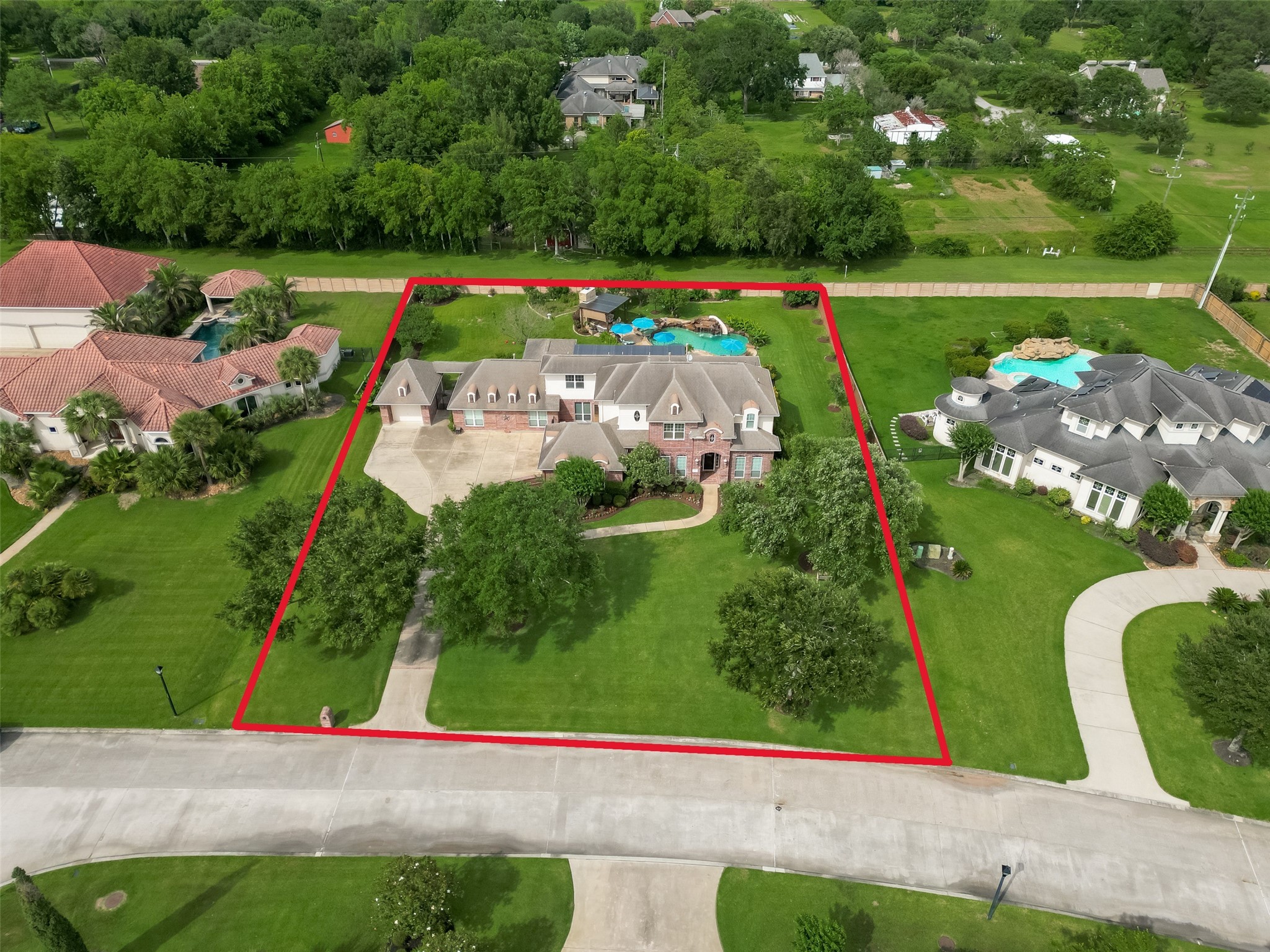 2319 Braer Ridge Drive Katy, TX 77494 - Photo 45 of 50 an aerial view of a golf course with chairs