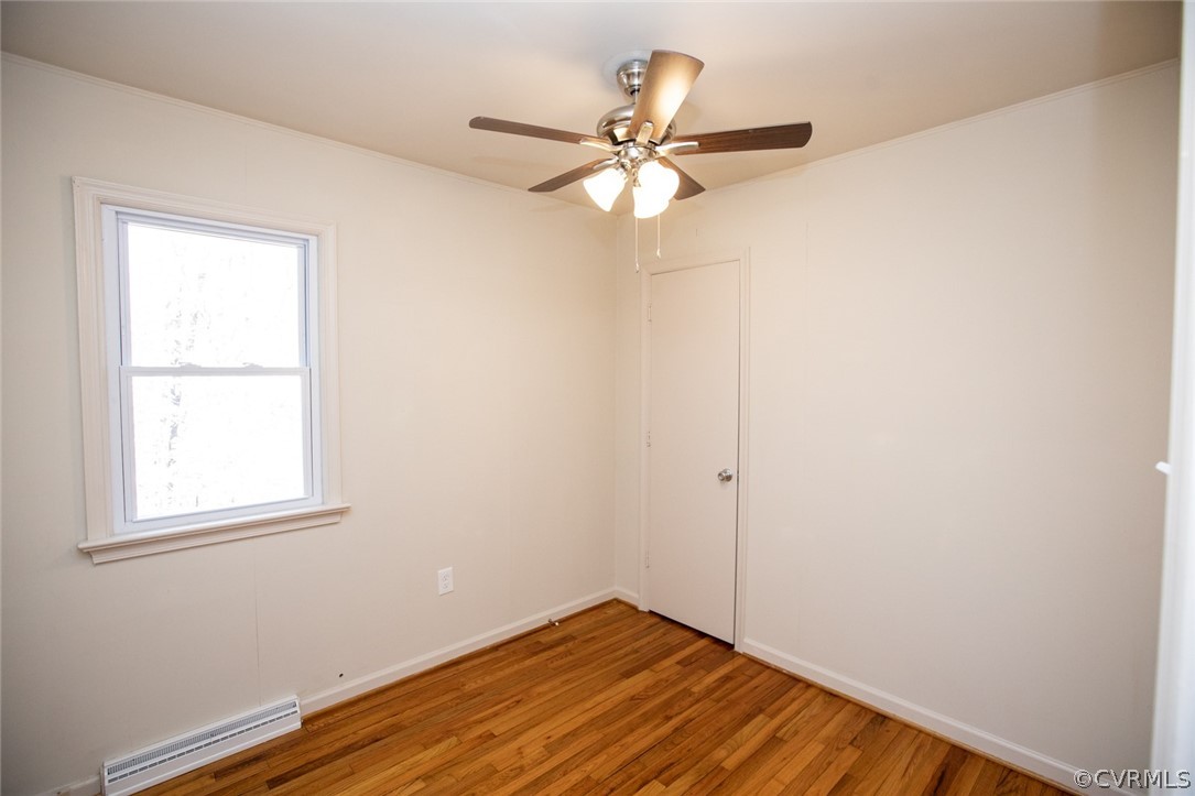 3488 Meherrin Road Meherrin, VA 23954 - Photo 26 of 50 an empty room with a window and a fan